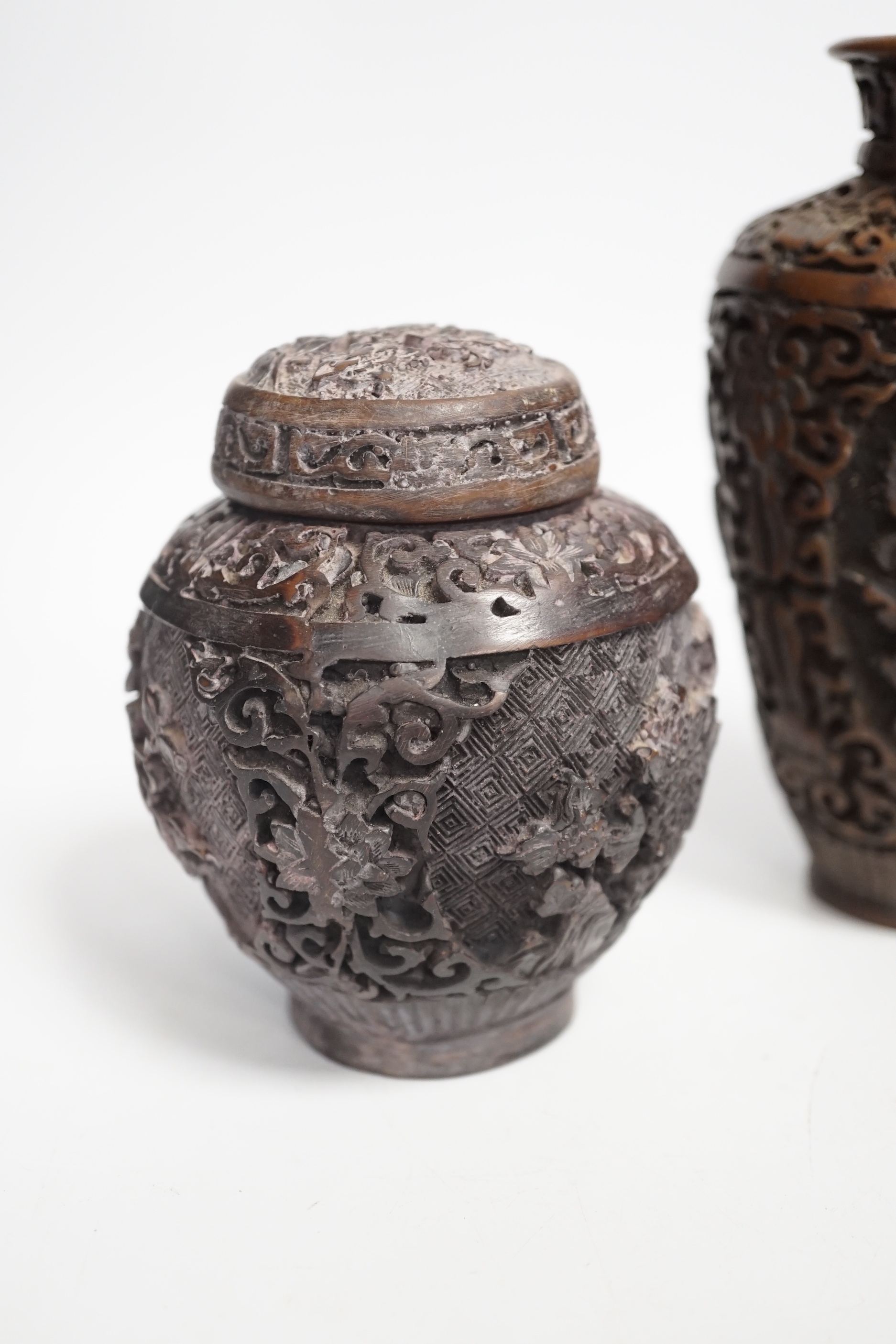 An Indian bronze bowl, two Chinese jars, 'dragon' bowl and a seated figure of Buddha, 15cm high